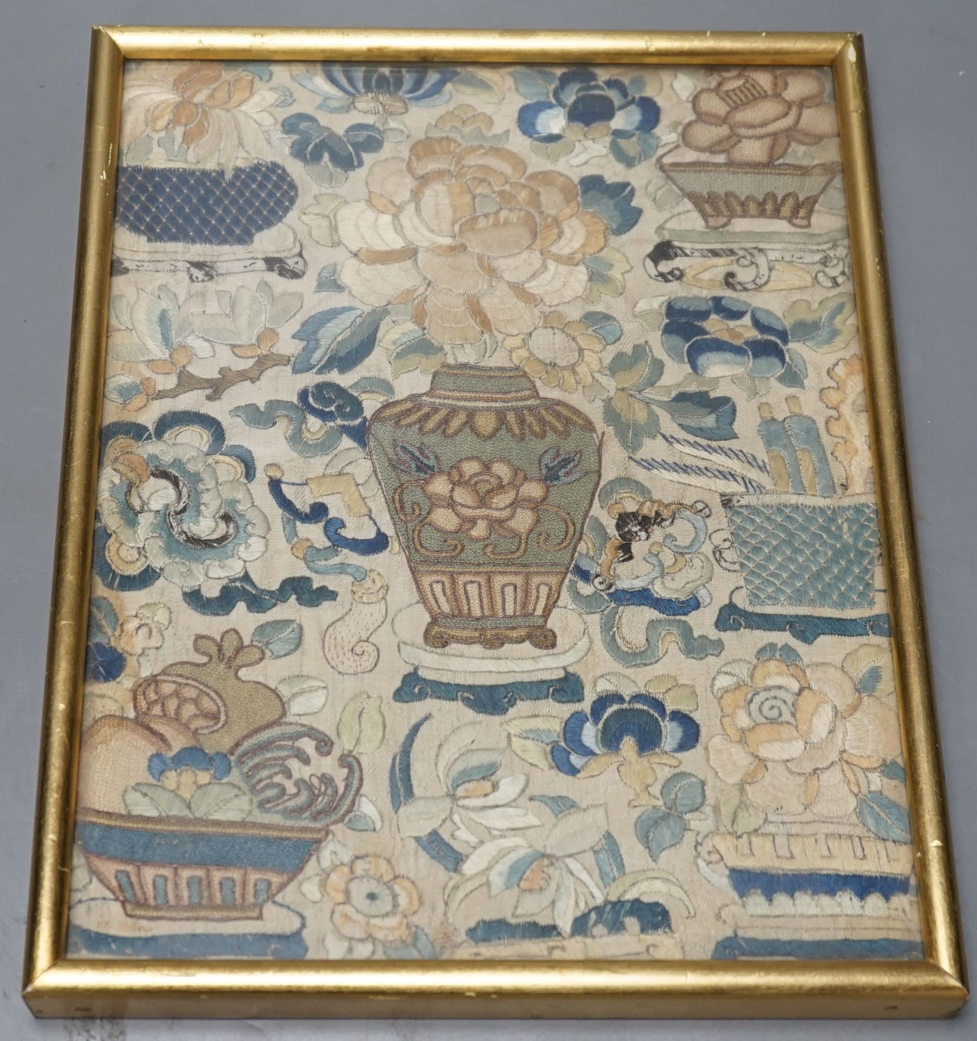 A late 19th century Chinese embroidered panel, worked with a vase of flowers, framed, 28 x 22cm